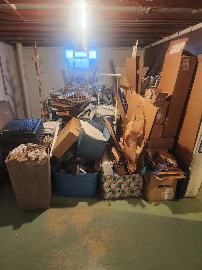 Roll-off dumpster container at job site for Roll Off Dumpster Rental in Manalapan